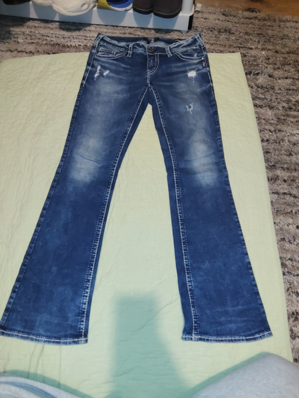 Silver Jeans Women's Dark Blue Distressed Flare Jeans